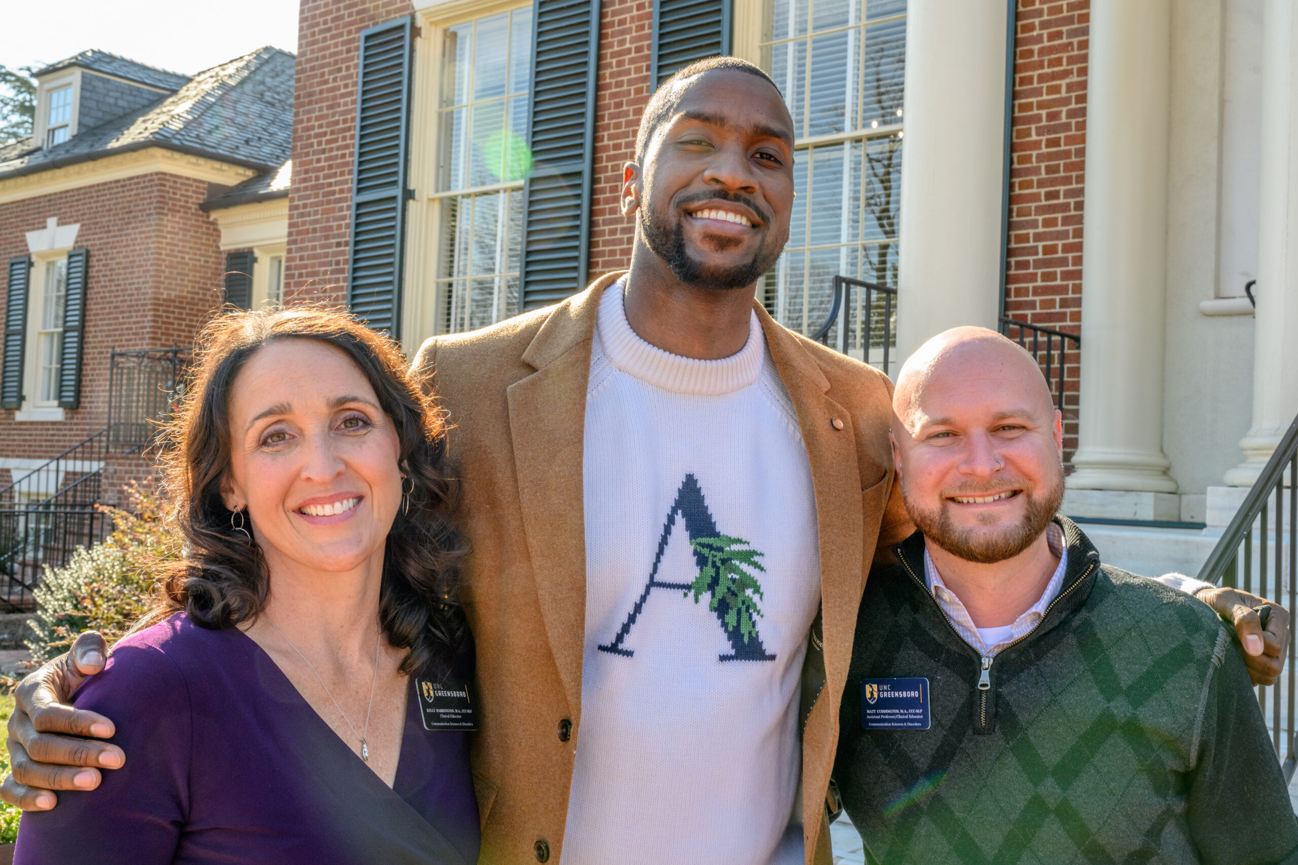 NBA player Michael Kidd-Gilchrist with Communication Sciences and Disorders faculty members.